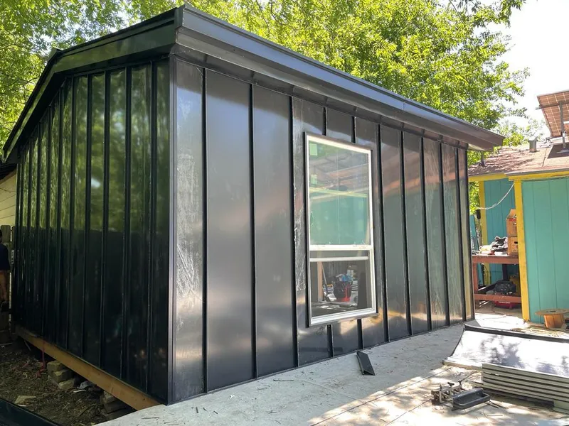 Black standing seam metal wall panels for Roof Inspection in Burlington